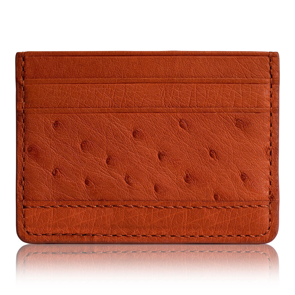 Card holder in orange ostrich leather